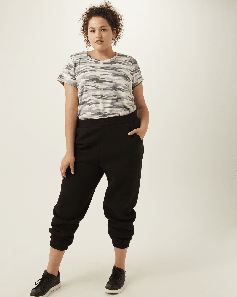 Plus size model with hourglass body shape wearing Kendall Joggers by Vero Moda | Dia&Co | dia_product_style_image_id:170275